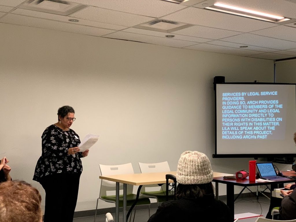 Theresa Sciberras, ARCH staff, presenting the agenda at Toronto's IDPD event, 2018.